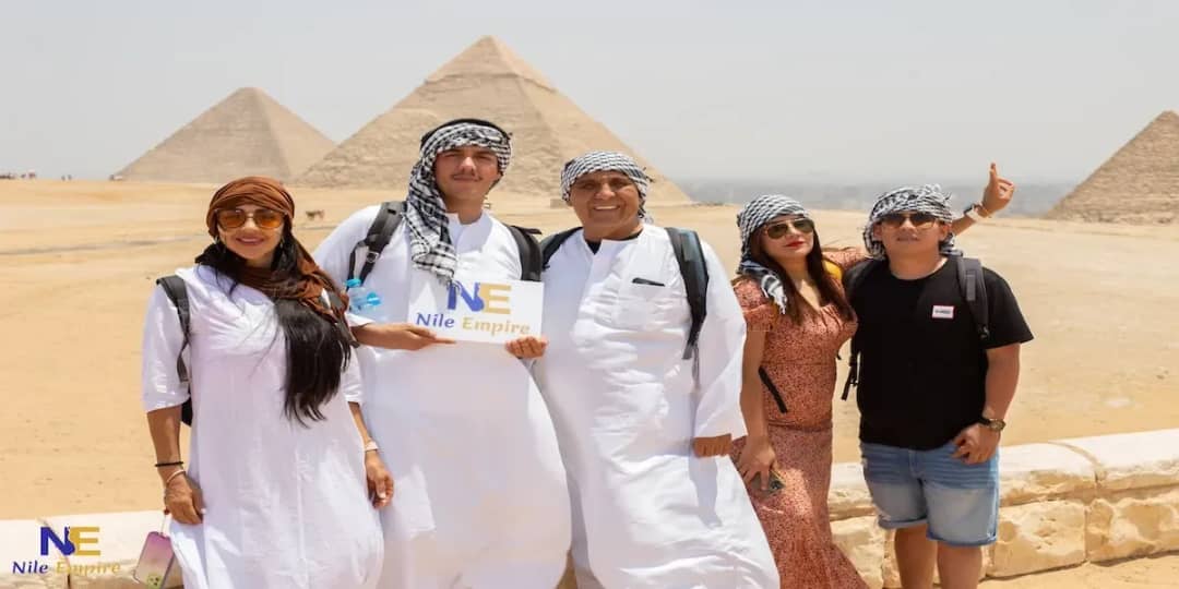 happy tourists giza pyramids nile empire