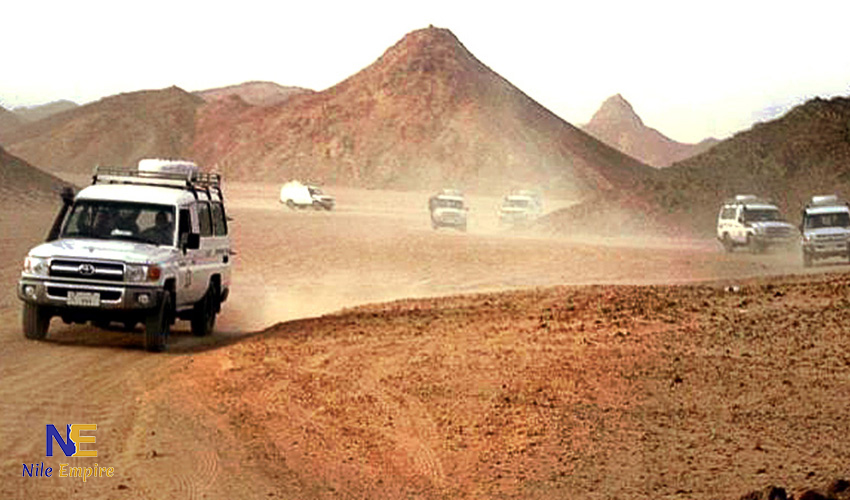 Traditional Bedouin village stop during a desert safari in Hurghada where tourists enjoy tea and camel rides