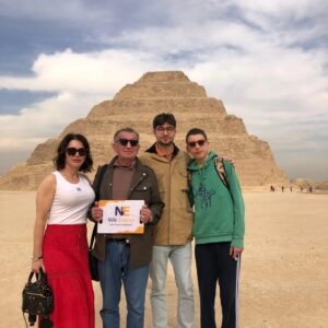 Tourists safely exploring the Zoser Pyramids with a certified guide, completely avoiding local antiquities scams